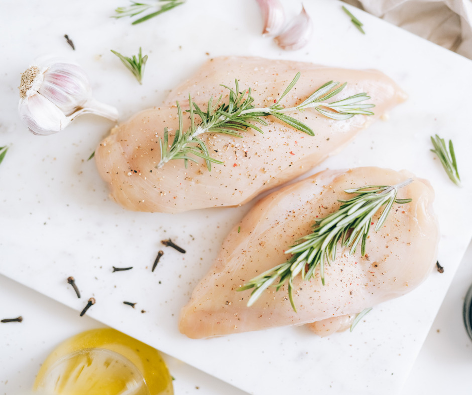 chicken breasts with rosemary twigs